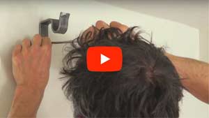 How to Put Up a Curtain Pole with Bracket